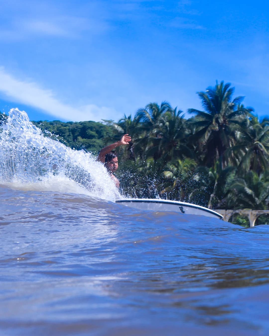 Surfing at Punta Fishermans, Playa Las Flores, La Libertad