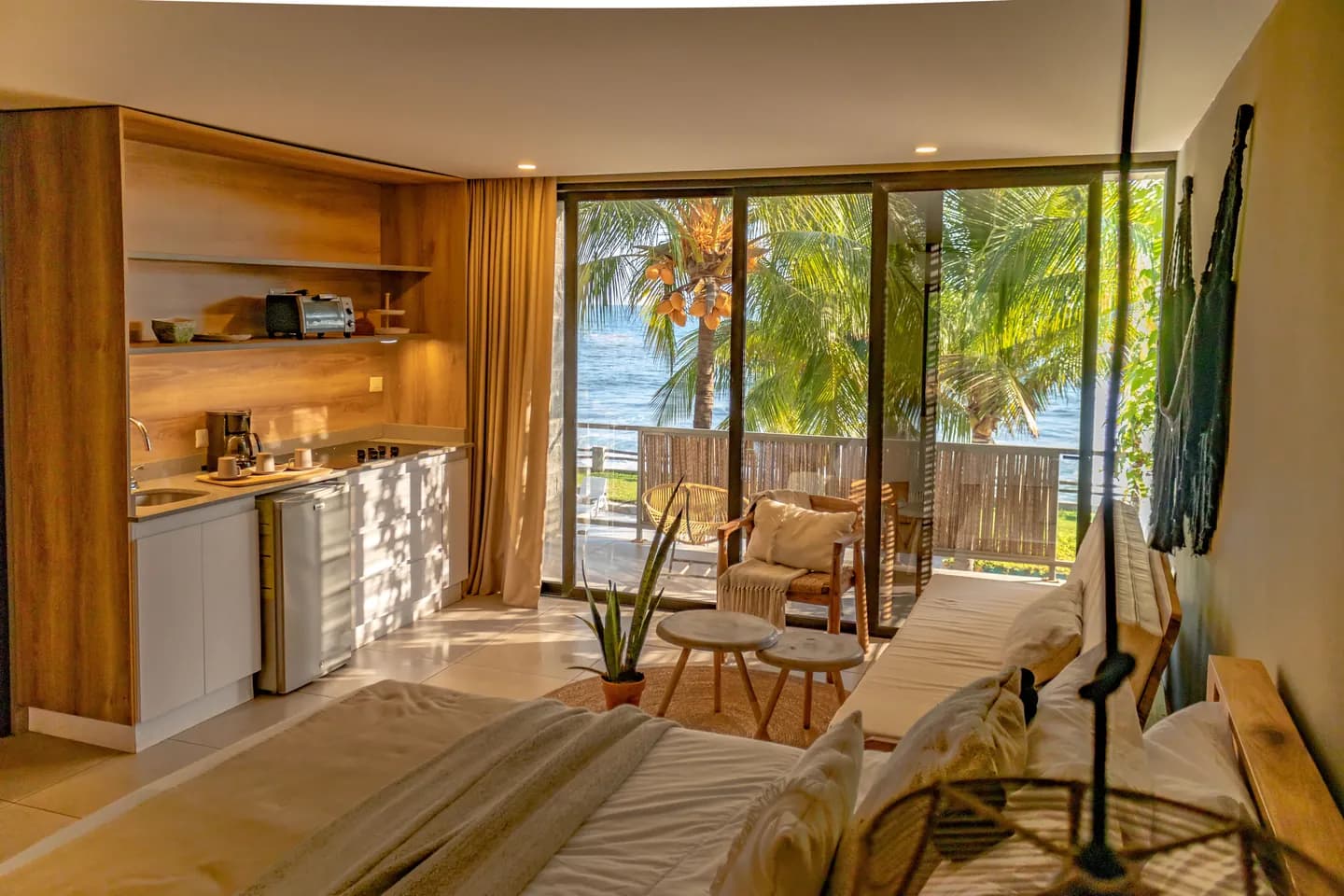 Deluxe Studio kitchenette and ocean-view terrace